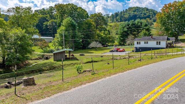 view of road with a rural view