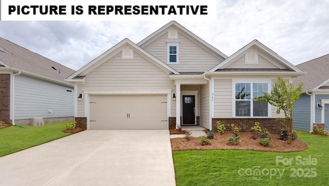 craftsman-style home featuring a front yard and a garage