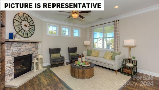 living room featuring ornamental molding, ceiling fan, a fireplace, and dark hardwood / wood-style flooring