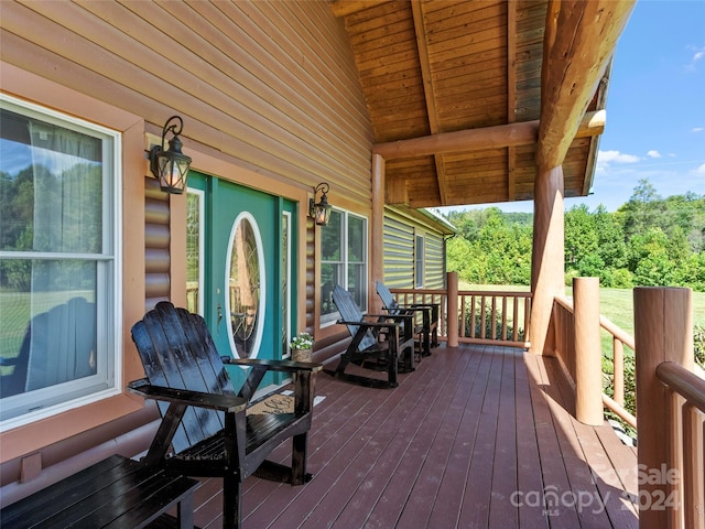 wooden terrace with covered porch