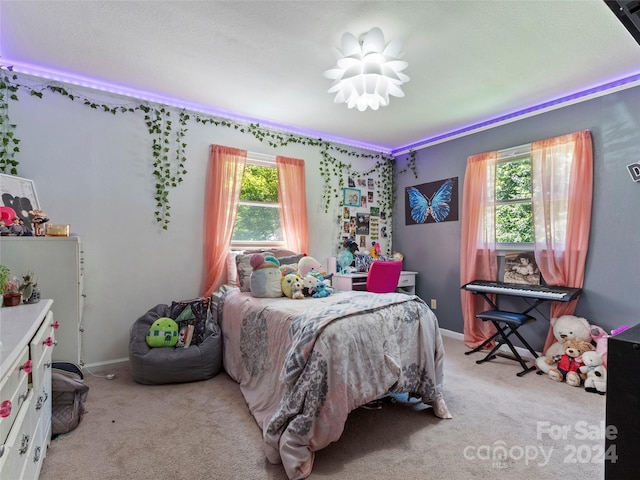 bedroom with light carpet