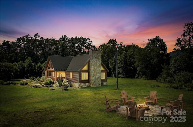 exterior space featuring a fire pit