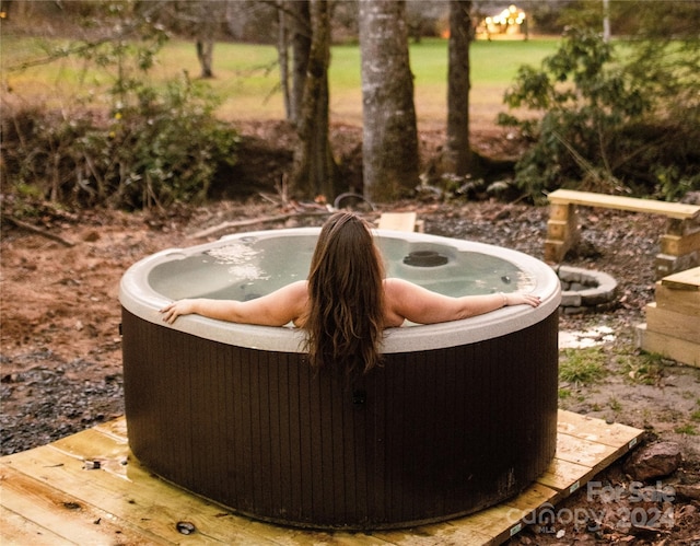 view of patio with a hot tub