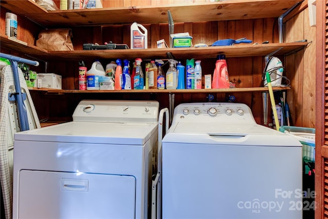 laundry area with washing machine and clothes dryer