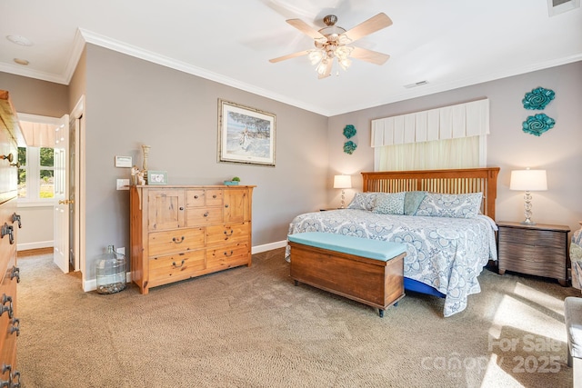 bedroom with ornamental molding, carpet floors, and ceiling fan