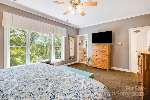 carpeted bedroom with crown molding, connected bathroom, and ceiling fan