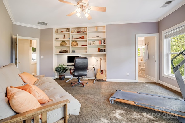 office space featuring crown molding, carpet floors, and ceiling fan