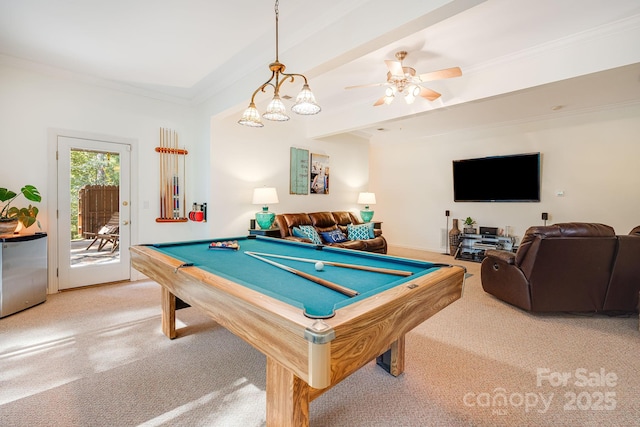 game room featuring beamed ceiling, ornamental molding, carpet floors, and ceiling fan