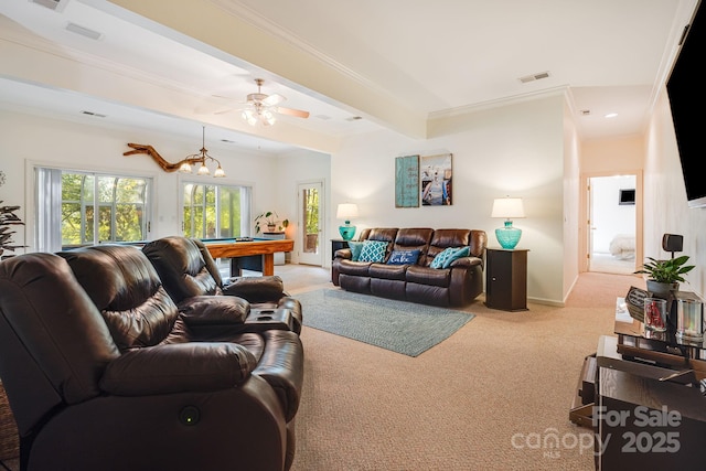 carpeted living room featuring beamed ceiling, pool table, crown molding, and ceiling fan with notable chandelier