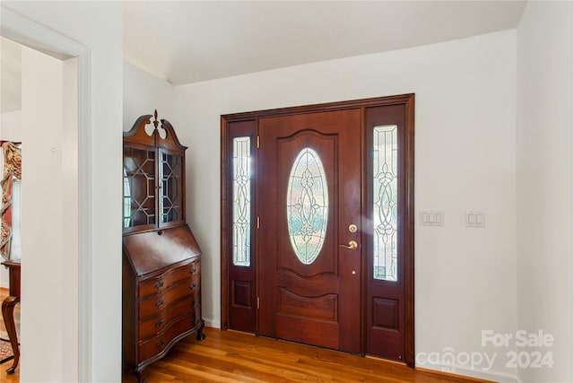 foyer entrance with light wood-type flooring