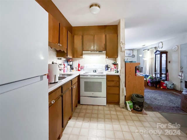 kitchen with white appliances