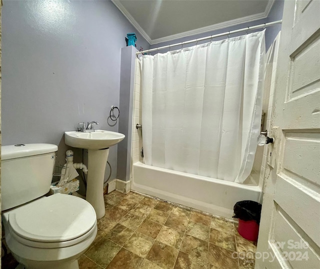 bathroom featuring shower / bath combo, toilet, and ornamental molding