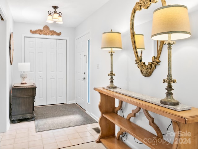 entrance foyer featuring light carpet