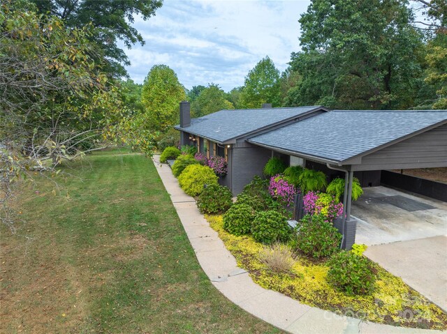 view of property exterior featuring a yard