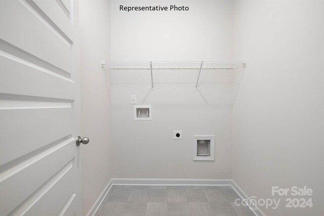 laundry room featuring hookup for a washing machine and electric dryer hookup