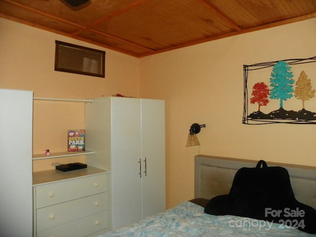 bedroom featuring wooden ceiling