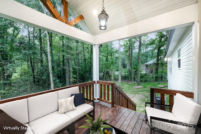 deck featuring outdoor lounge area