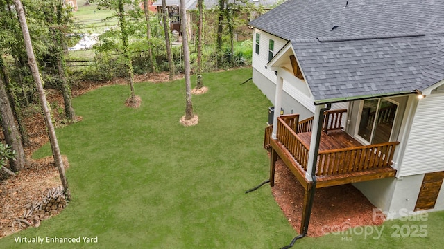 view of yard with cooling unit and a wooden deck