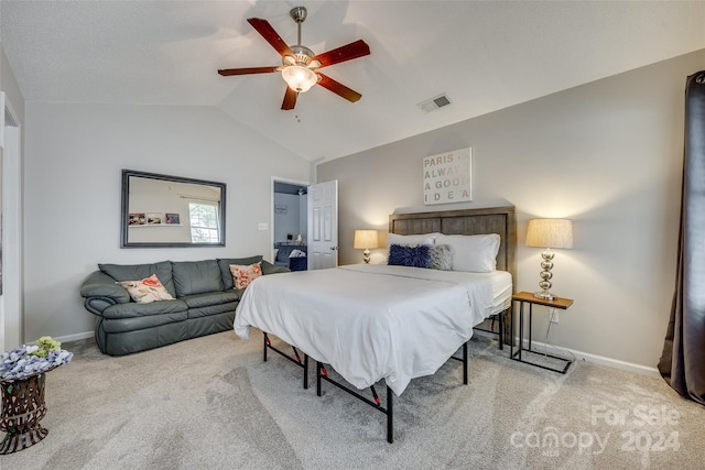 carpeted bedroom with lofted ceiling and ceiling fan