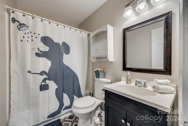 bathroom featuring walk in shower, toilet, a textured ceiling, and vanity