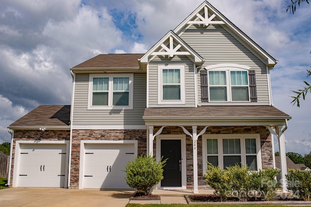 view of front of property featuring a garage