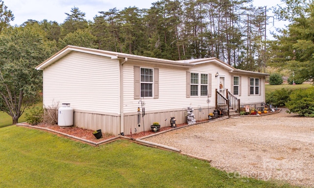 view of front of property with a front lawn