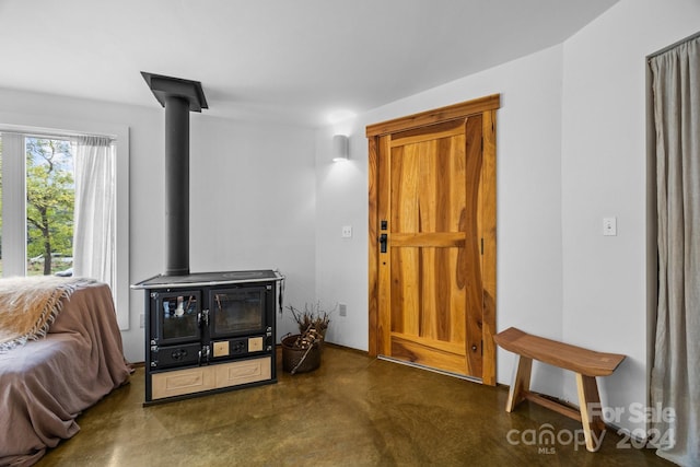 living room with a wood stove