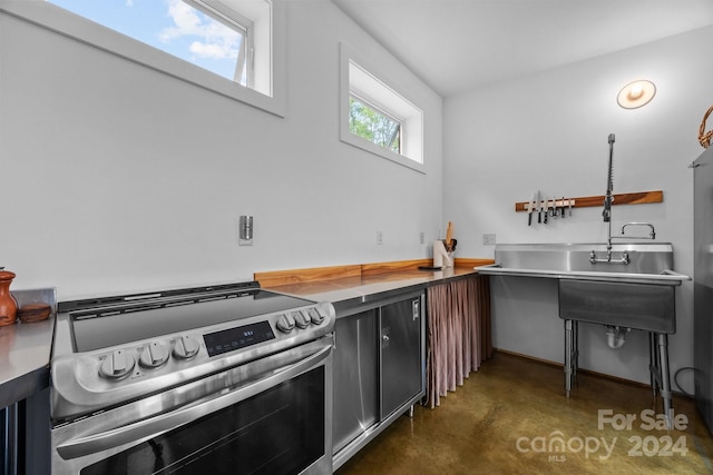 44 Brookside Dr, Burnsville, NC 28714 - kitchen featuring stainless steel range oven, finished concrete floors, and stainless steel counters