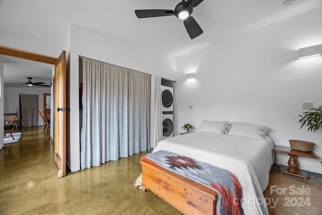 44 Brookside Dr, Burnsville, NC 28714 - bedroom featuring stacked washer / drying machine and a ceiling fan