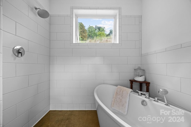 bathroom featuring shower with separate bathtub and tile walls