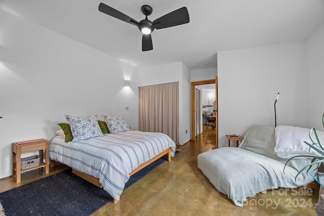 44 Brookside Dr, Burnsville, NC 28714 - bedroom featuring a ceiling fan and concrete floors