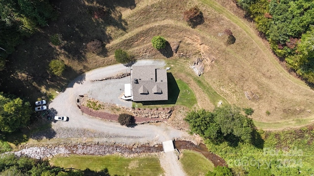 birds eye view of property featuring a rural view