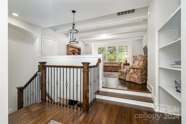 stairs featuring hardwood / wood-style flooring