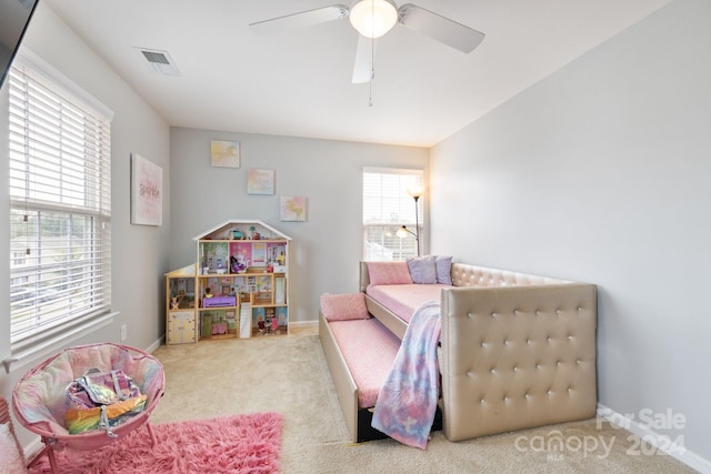 carpeted bedroom featuring ceiling fan