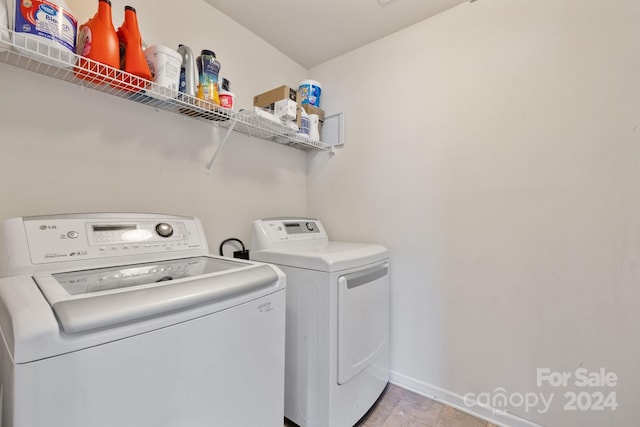 laundry room featuring washer and dryer