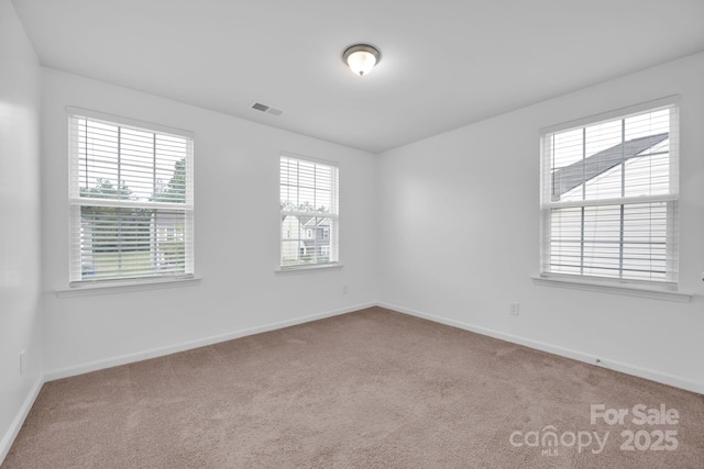 empty room with carpet floors