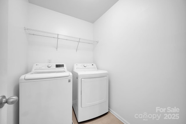 laundry area featuring separate washer and dryer