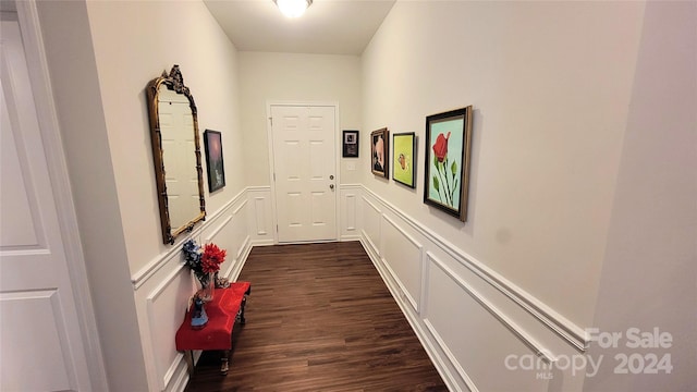 hallway featuring dark wood-type flooring