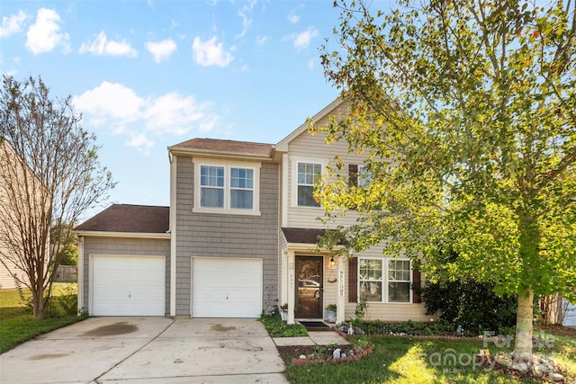 view of front of property with a garage