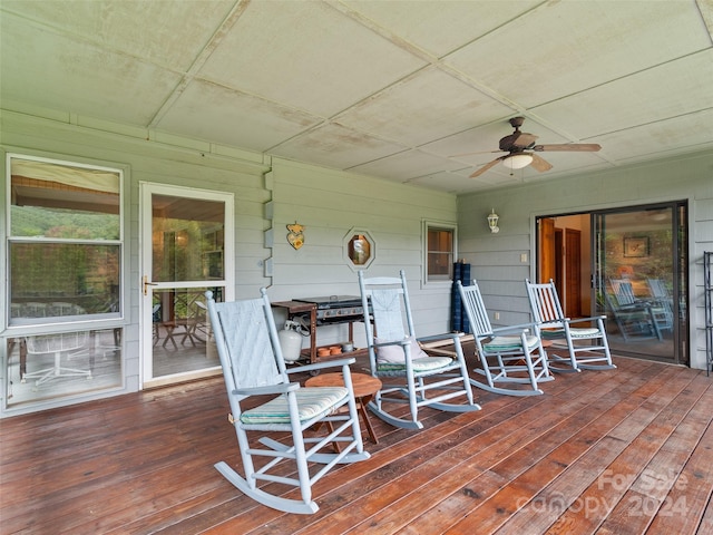 wooden terrace with ceiling fan