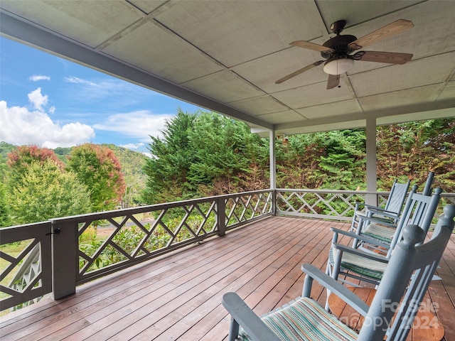 wooden terrace with ceiling fan