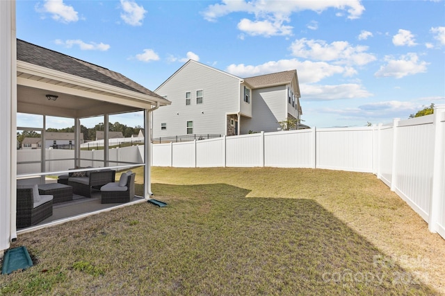 view of yard featuring an outdoor living space and a patio area