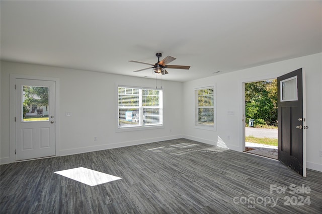 entryway featuring dark wood-type flooring, plenty of natural light, and ceiling fan