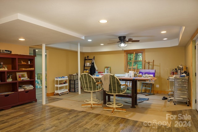 dining room with wood-type flooring and ceiling fan