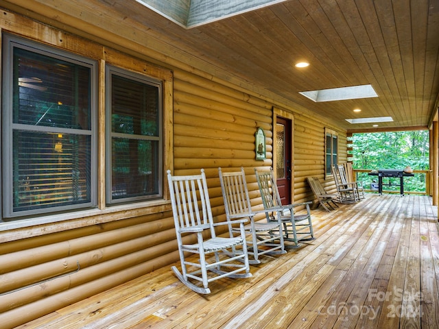 deck with covered porch