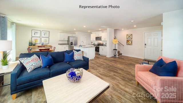 living room with wood-type flooring