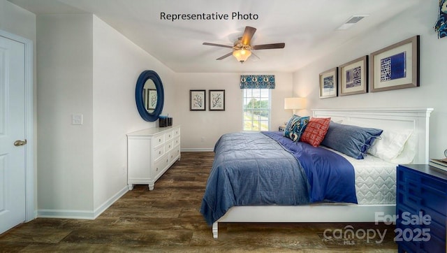 bedroom featuring dark hardwood / wood-style floors and ceiling fan