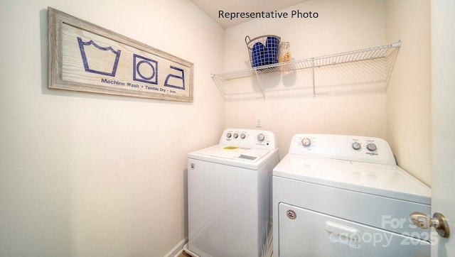 washroom with separate washer and dryer