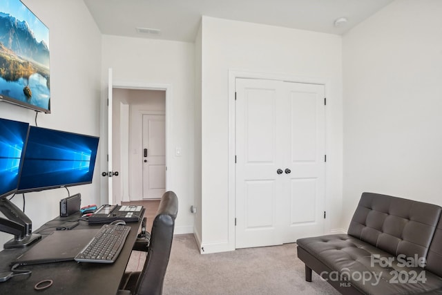 office space with light colored carpet