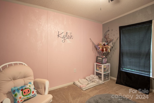 rec room featuring carpet flooring, ornamental molding, a textured ceiling, and vaulted ceiling